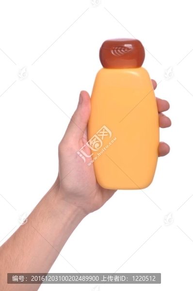 手拿防曬霜