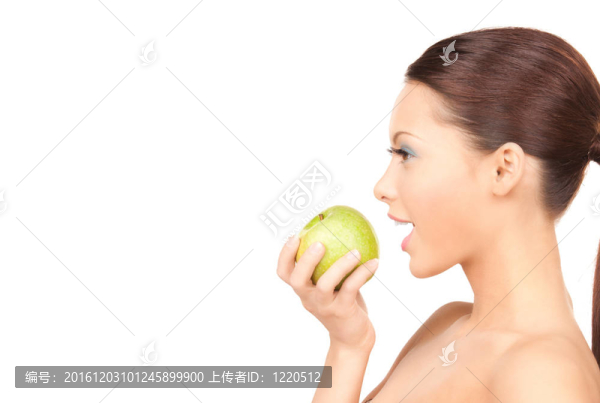 年輕美麗的女人和綠色的蘋(píng)果
