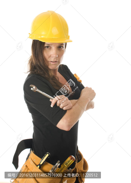 女女承包商建設(shè)者與保護(hù)帽頭盔和工具帶工具