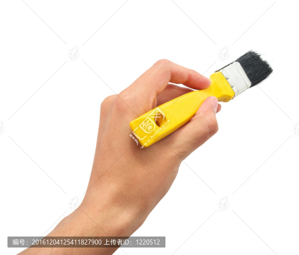 帶有黃色刷子的手