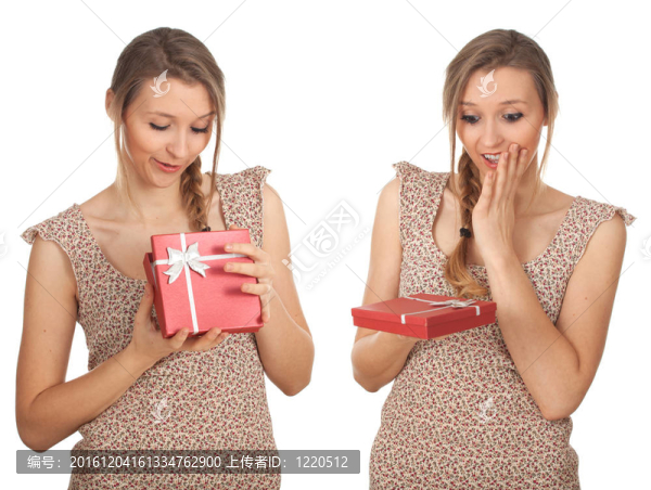 美麗的年輕女子在禮服與禮品盒