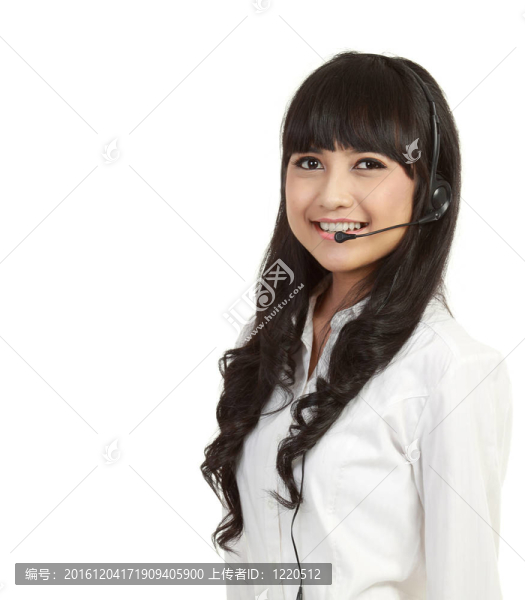 一位成功的女性客服中心戴著耳機(jī)的肖像。在白色的背景