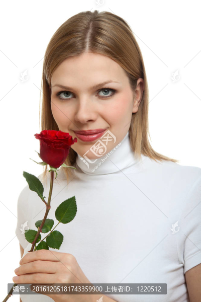 年輕貌美的女人配一朵紅玫瑰