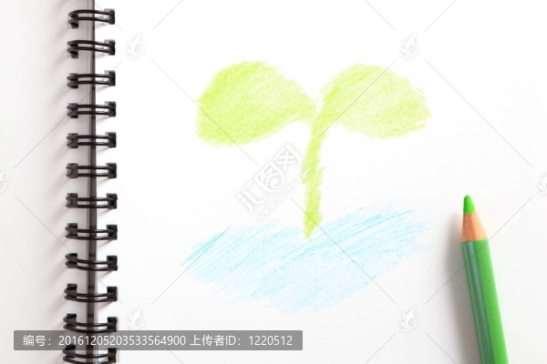 筆記本（綠色樹苗）和綠色的鉛筆