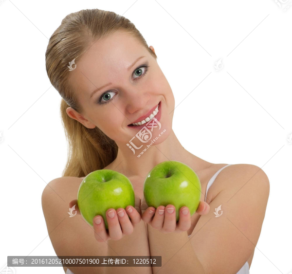 美麗的健康女孩舉行一二綠蘋果隔離