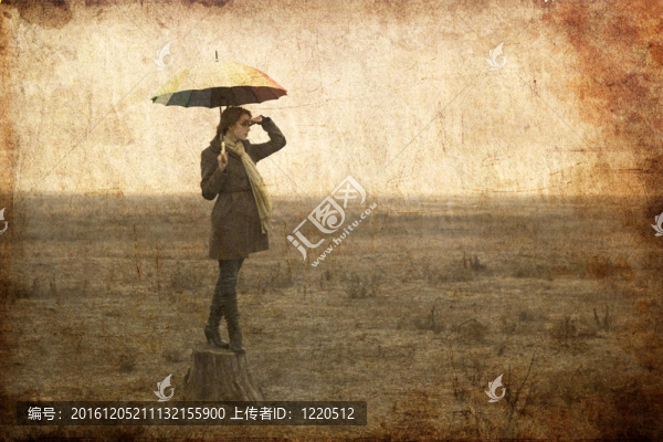 紅發(fā)女孩在戶外傘。