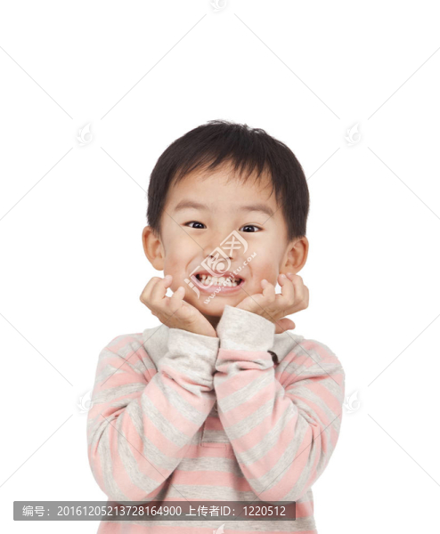 亞洲的孩子表示驚訝與他的手在他的臉上