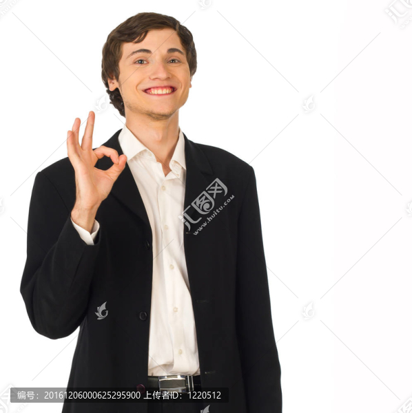 年輕的商人微笑著表現(xiàn)出良好的姿態(tài)