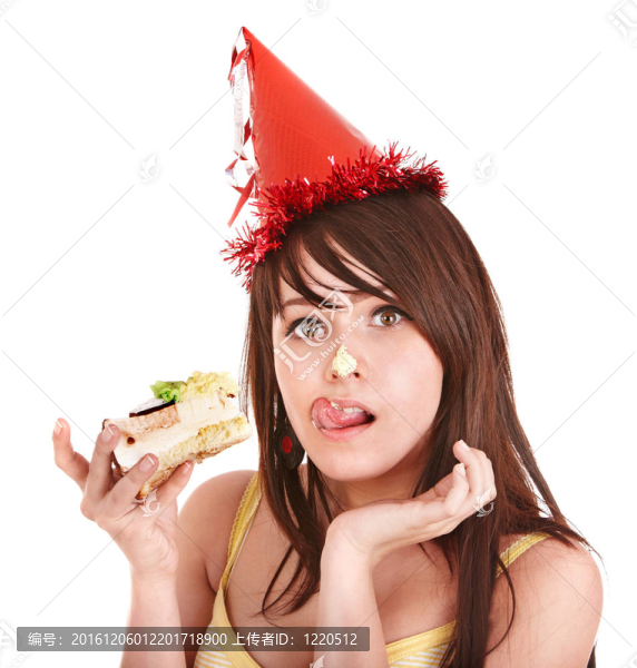 快樂的年輕女人吃蛋糕。