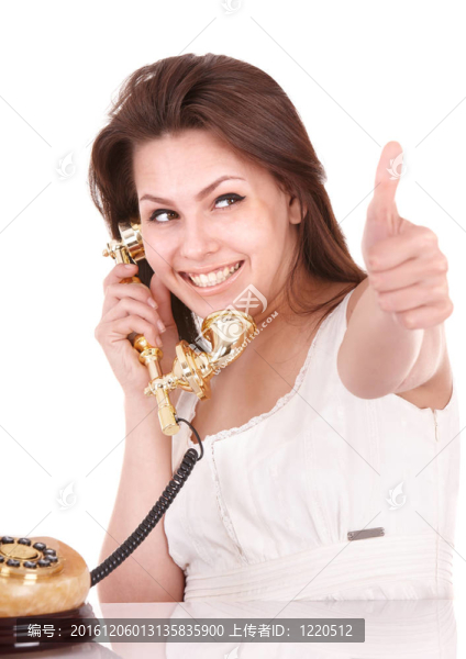 年輕漂亮的女人帶電話。