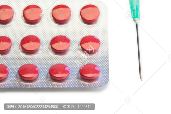 紅色藥丸和注射器