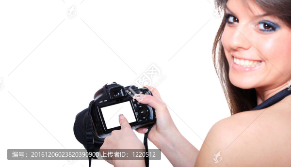 隨著數(shù)碼單反相機的女人