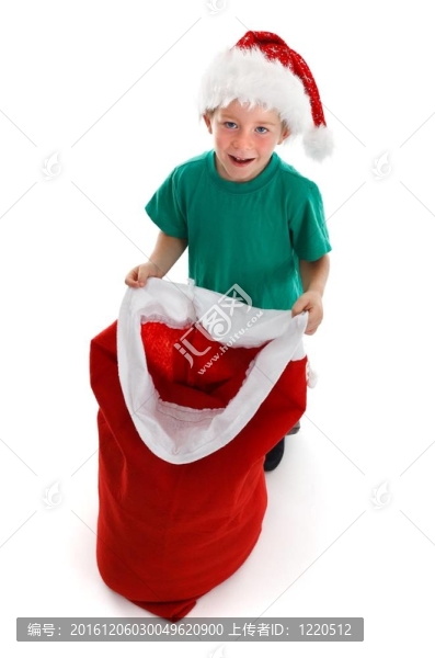 快樂小男孩抱著開Santa麻袋