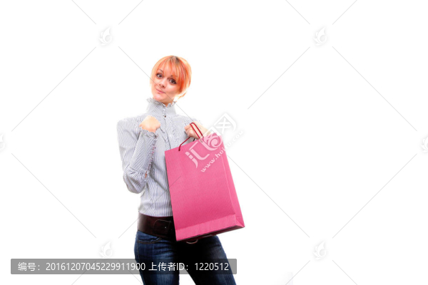 快樂的年輕女孩與彩色袋
