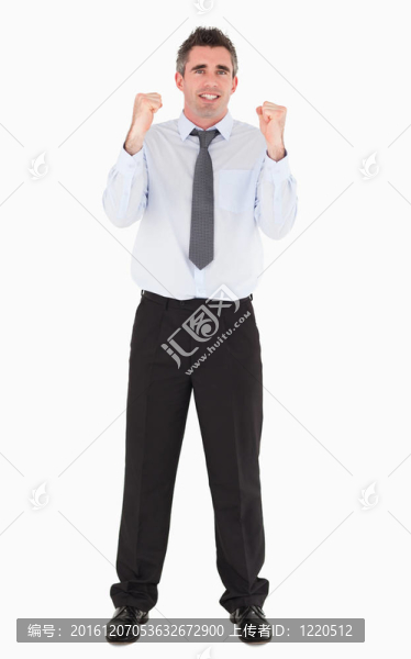 快樂的商人用拳頭