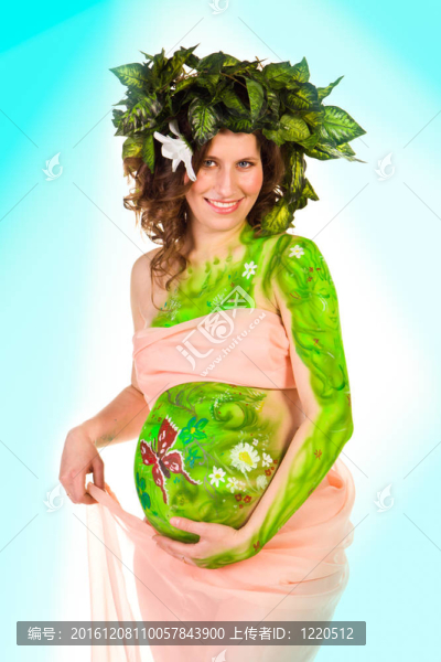 孕婦與身體藝術綠葉
