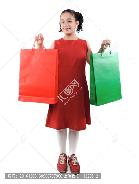 帶購物袋和盒子的小女孩