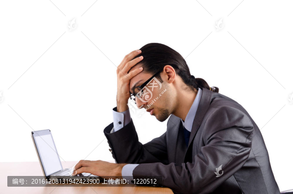商人坐在辦公桌旁