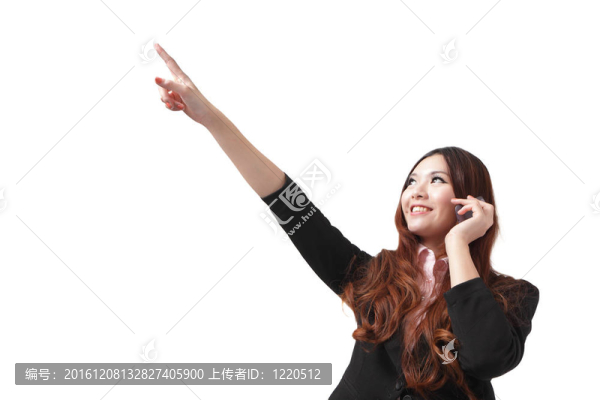 商務(wù)女性講手機(jī)和指點(diǎn)