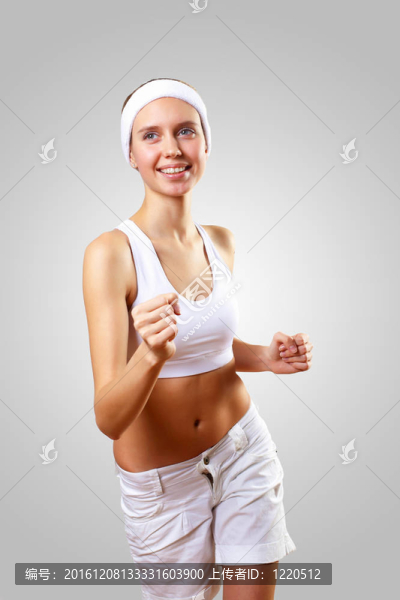 穿運(yùn)動(dòng)服的年輕漂亮女人