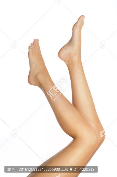 性感健康苗條女性雙腿白色背景隔離-美容保健理念