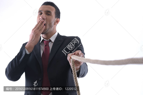 白色背景下繩分離的商人
