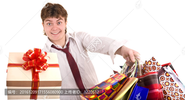 帶禮物盒的快樂男人。購物.