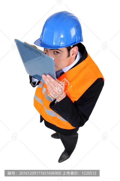 商人在建筑工地做筆記