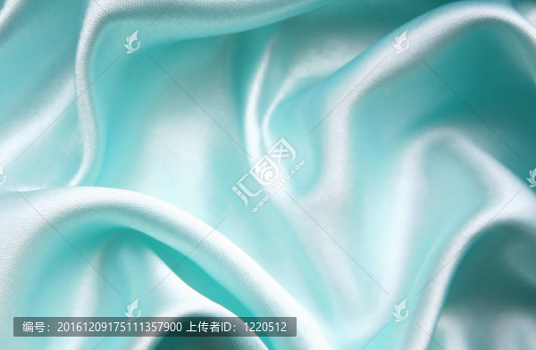 光滑優(yōu)雅的藍(lán)色絲綢為背景