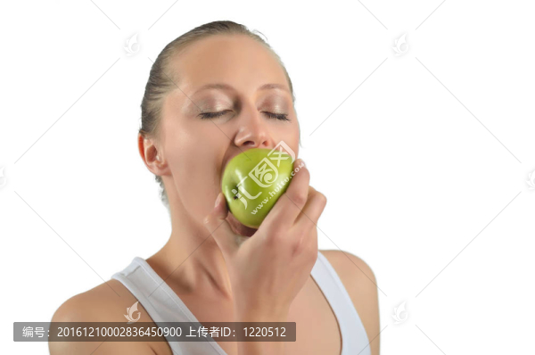 誘人的女人吃蘋果