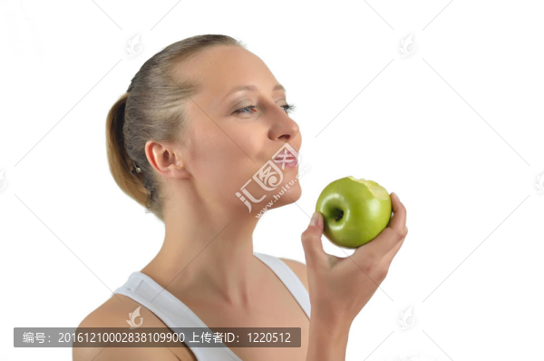 誘人的女人吃蘋果