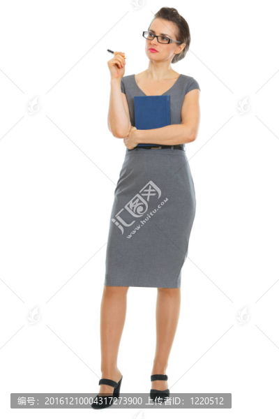 體貼的學(xué)生婦女與筆記本和筆