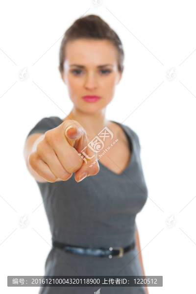 女商人指著你。專注于手指