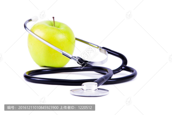綠色的；成熟的蘋果和聽診器。