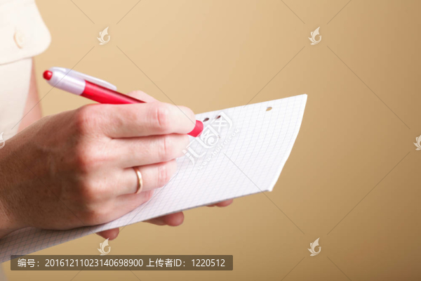 筆記本和紅筆女