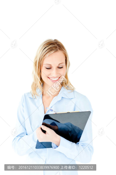 熾熱的年輕女商人做筆記對(duì)她的記錄