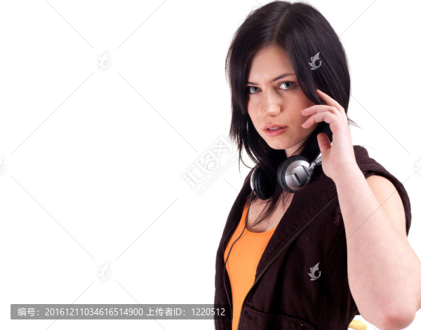 年輕的女人帶著耳機(jī)、MP3播放器