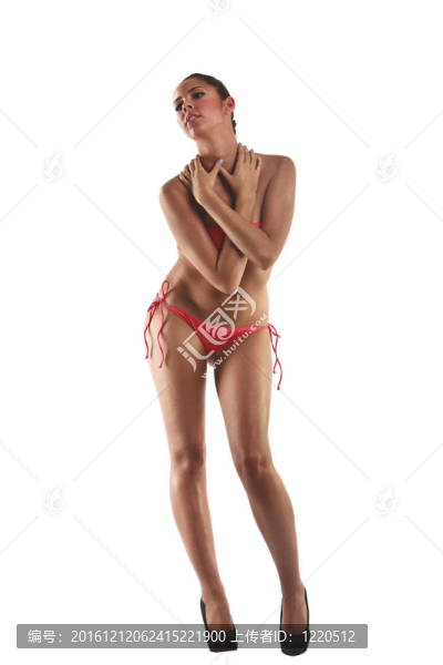 美麗的年輕女子身穿粉色比基尼