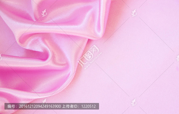 光滑優(yōu)雅的粉紅色絲綢為背景