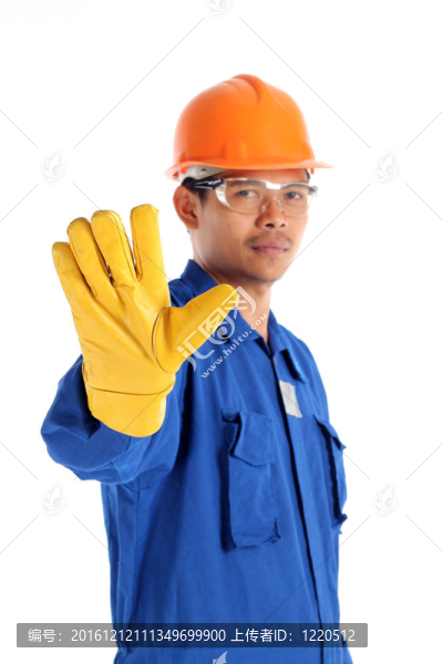 建筑工人顯示停車標(biāo)志。白色隔離。