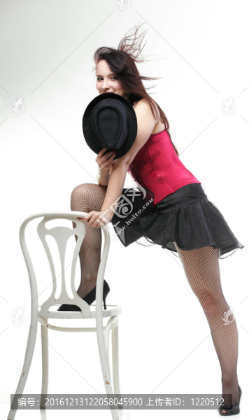 在紅色的緊身衣椅白孤立女人跳舞女郎