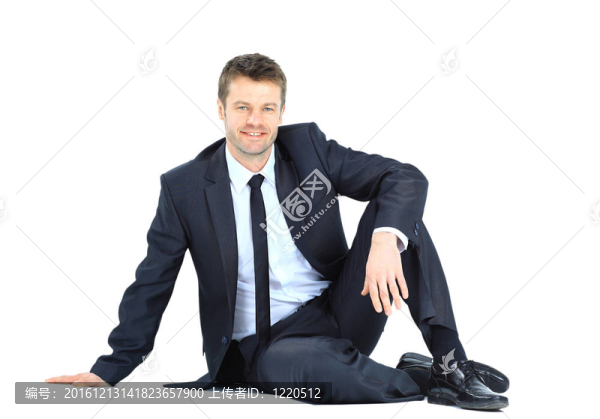 商人的肖像坐在地板上孤立在白色背景