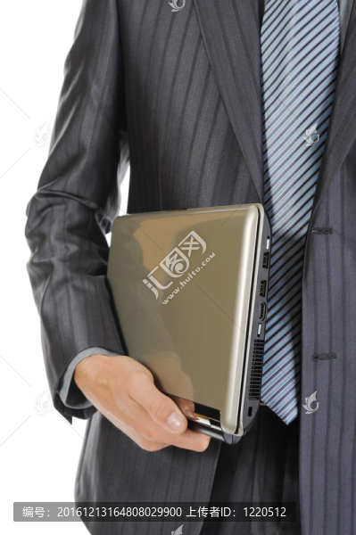 商人拿著筆記本電腦