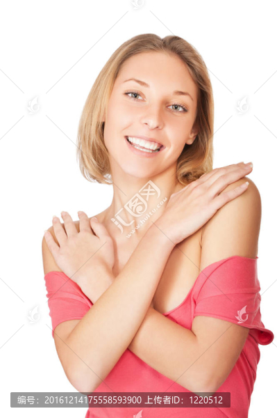 美麗的年輕女子微笑著站在手上反對(duì)孤立的白色背景