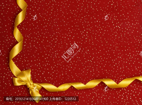 紅色背景上的緞帶和蝴蝶結(jié)；圣誕禮物背景