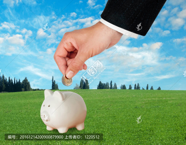 piggi銀行和手的硬幣