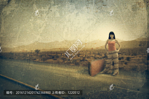 年輕女子帶著手提箱上路