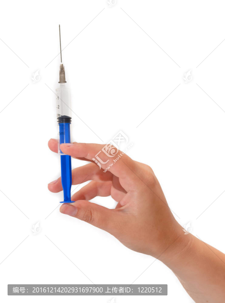 帶注射器的手