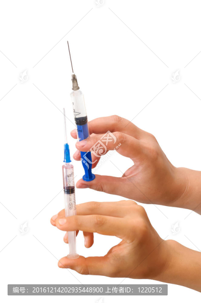 帶注射器的手