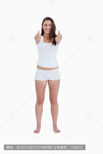 幸福的女人豎起大拇指